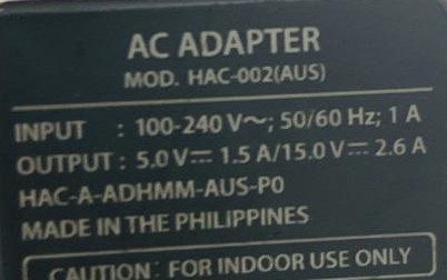 Switch原装充电器型号标签特写